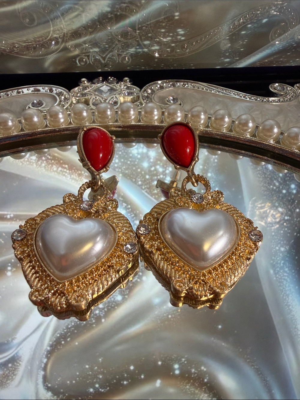 Gold Heart Drop Earrings with Pearl Center and Red Accent